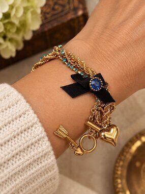 Betsey Johnson Blue Crystal & Black Bow Charm Bracelet – Gold Tone Multi-Strand
